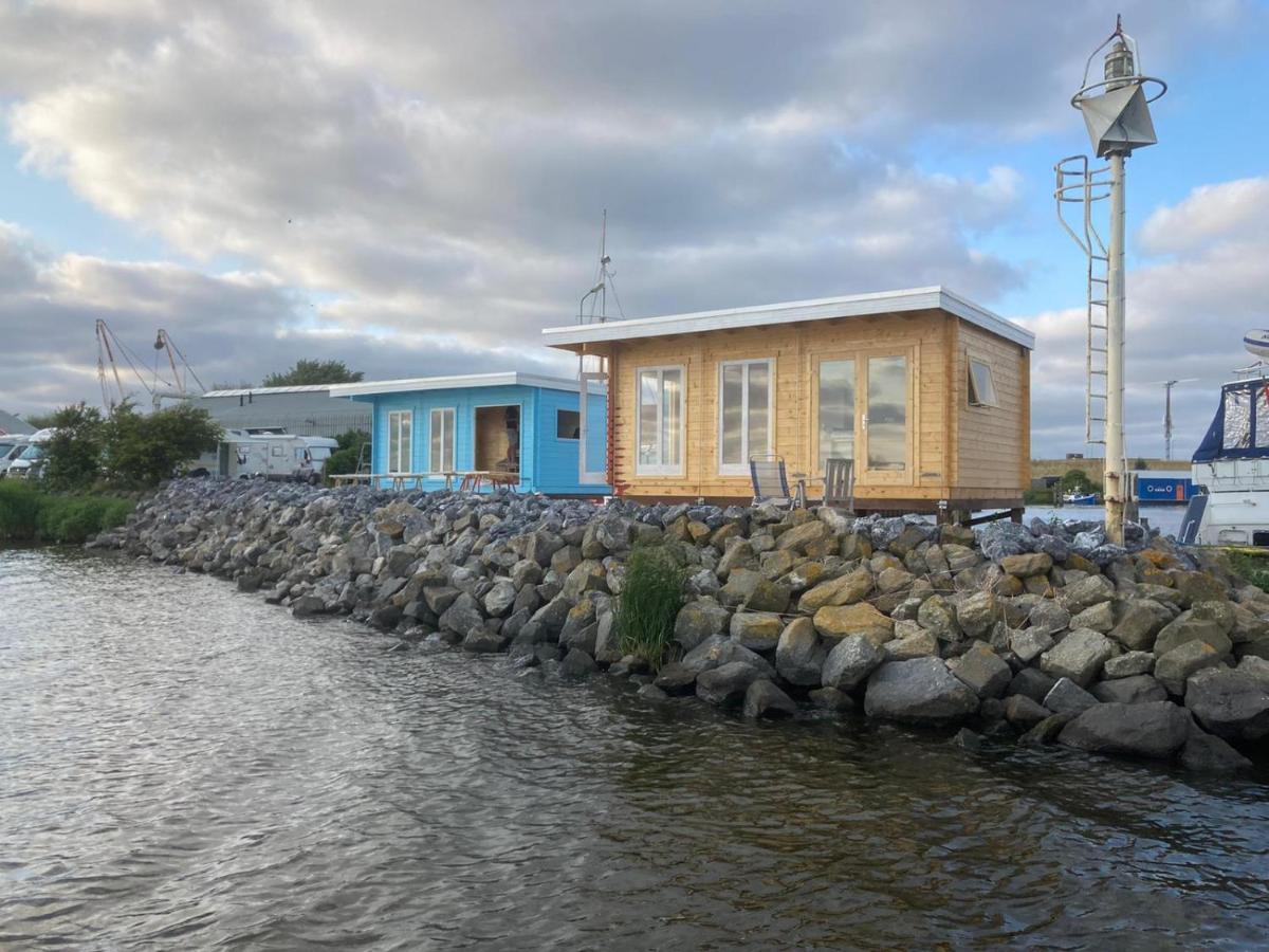 Waterhuisjes Op De Pier Van Lauwersmeerplezier! Лауверсог Екстериор снимка