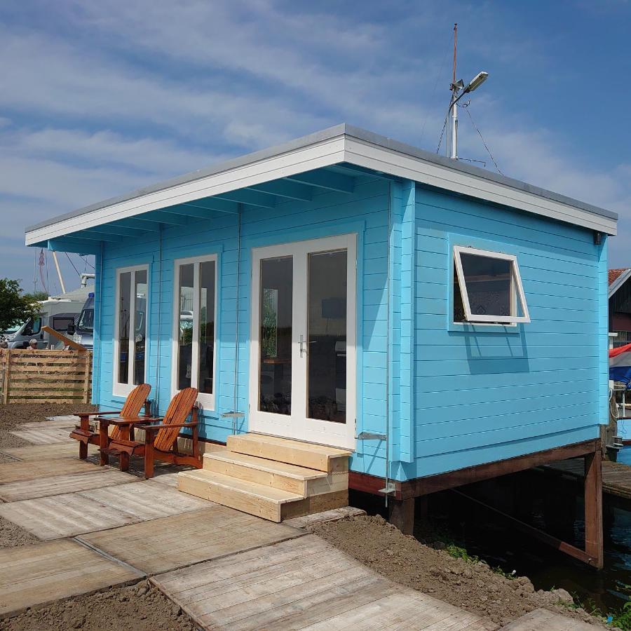 Waterhuisjes Op De Pier Van Lauwersmeerplezier! Лауверсог Екстериор снимка