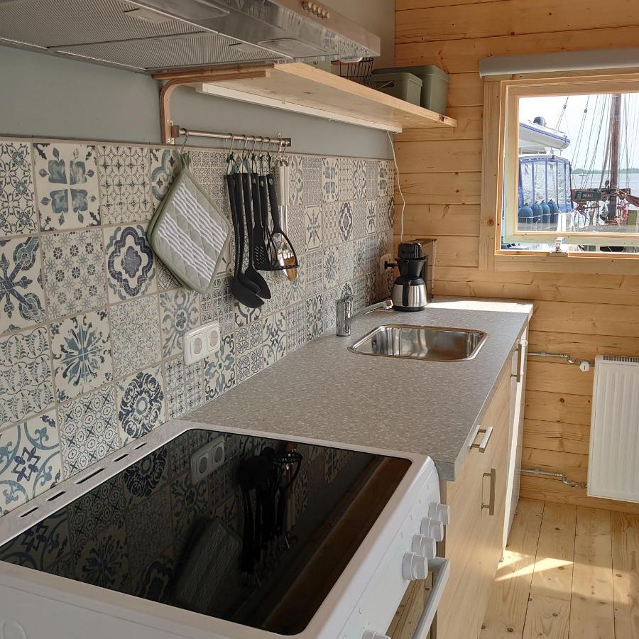 Waterhuisjes Op De Pier Van Lauwersmeerplezier! Лауверсог Екстериор снимка