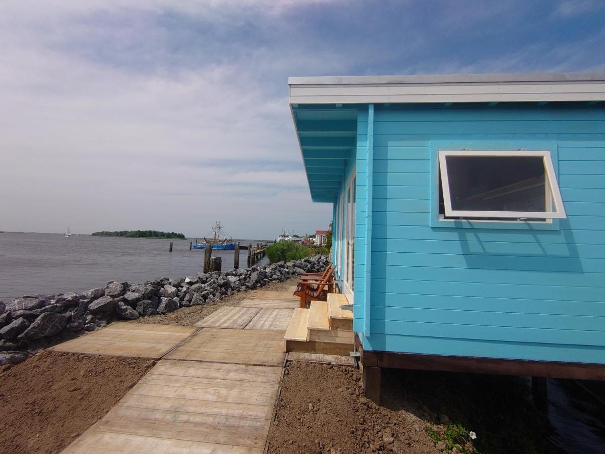 Waterhuisjes Op De Pier Van Lauwersmeerplezier! Лауверсог Екстериор снимка